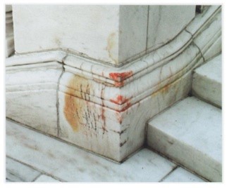 Red stains on a marble staircase